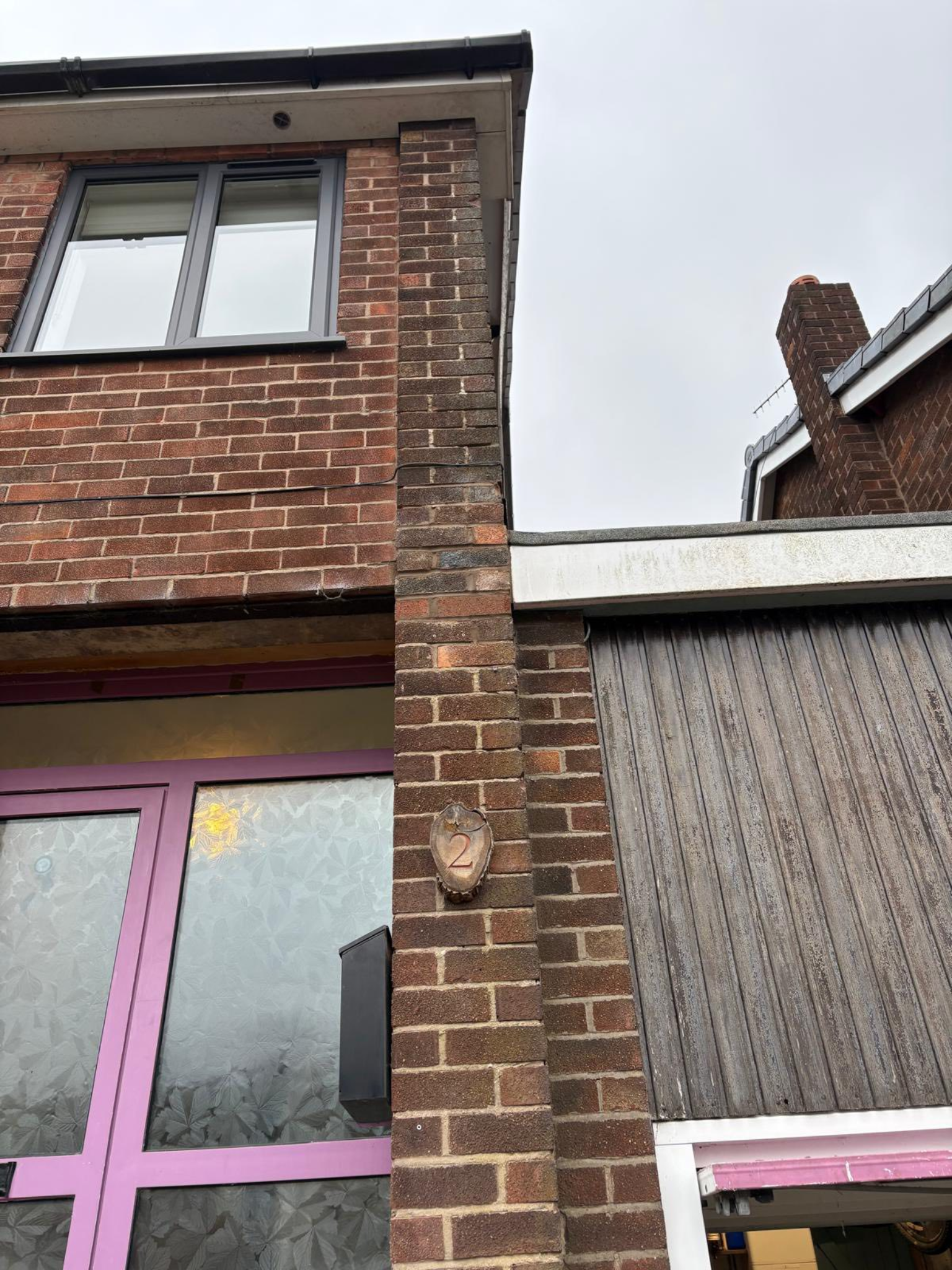 Vertical brickwork repair and colour matching